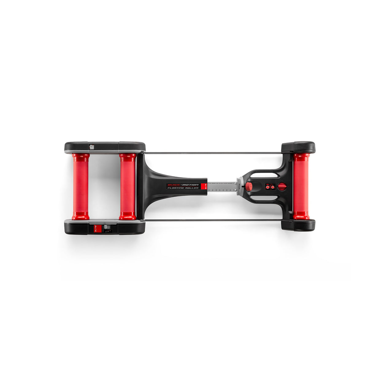 Elite Quick-Motion rollers from above: three red drums, centre rail and front-drum adjuster