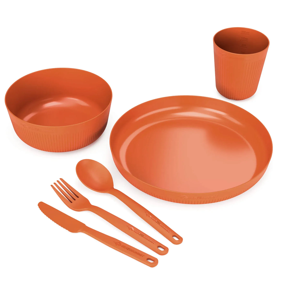 Burnt Orange Camp Dinnerware Set pieces spread out: bowl, plate, cup and cutlery