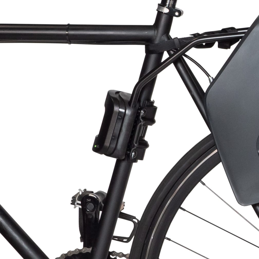 Burley Frame Mounting Block clamped to a black bike frame tube with the Dash seat rails slotted in