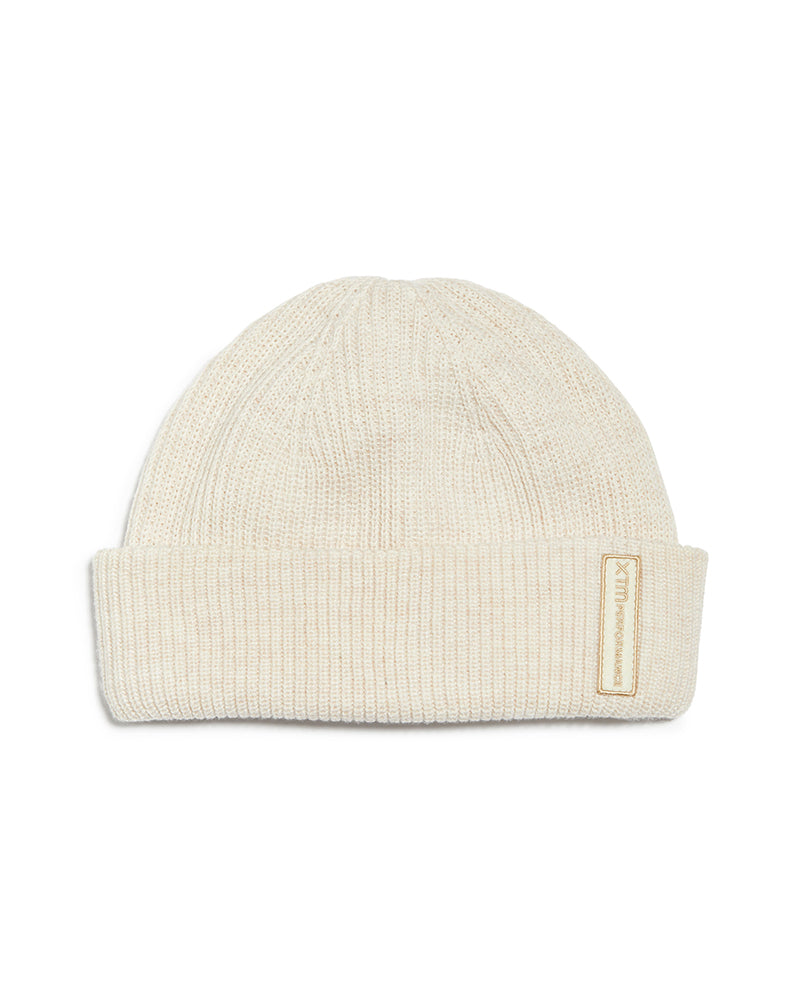 Cream XTM Casey wool-blend beanie, rib knit with folded cuff and embroidered badge
