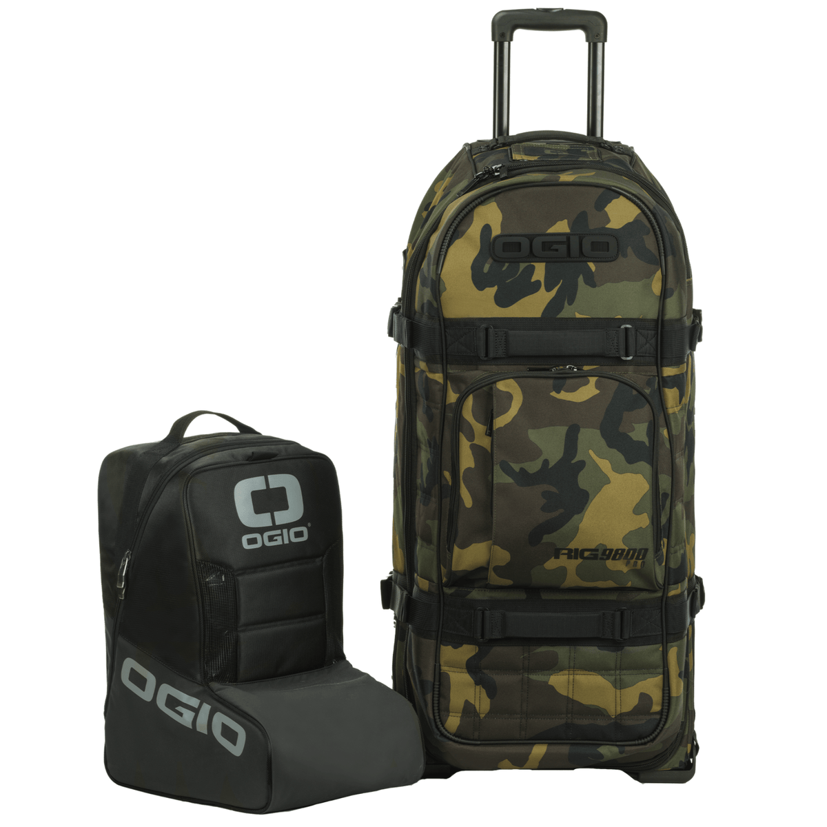 OGIO Rig 9800 Pro wheeled gear bag in Woody camo with telescopic handle up, beside its black MX boot bag