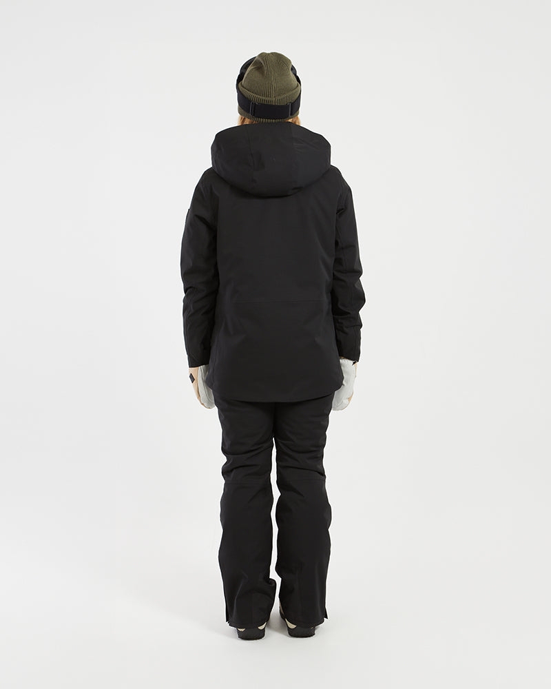 Back view of the black XTM Elevation II women's ski jacket with hood down