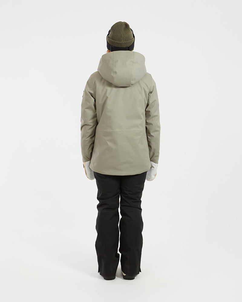 Back view of the Light Khaki XTM Elevation II women's ski jacket with hood down