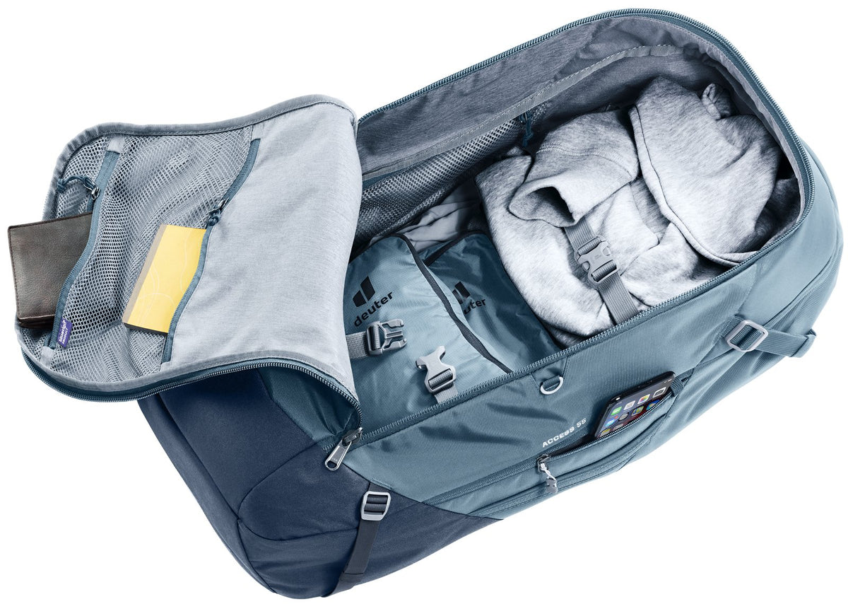 Deuter Access 55 in Atlantic Ink laid open, front panel folded back over packed clothes