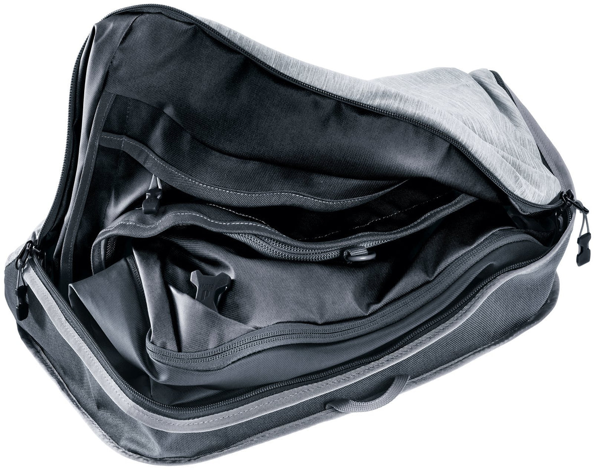 Inside the lid of the Deuter Duffel Pro 60 showing the arched zip and mesh pocket
