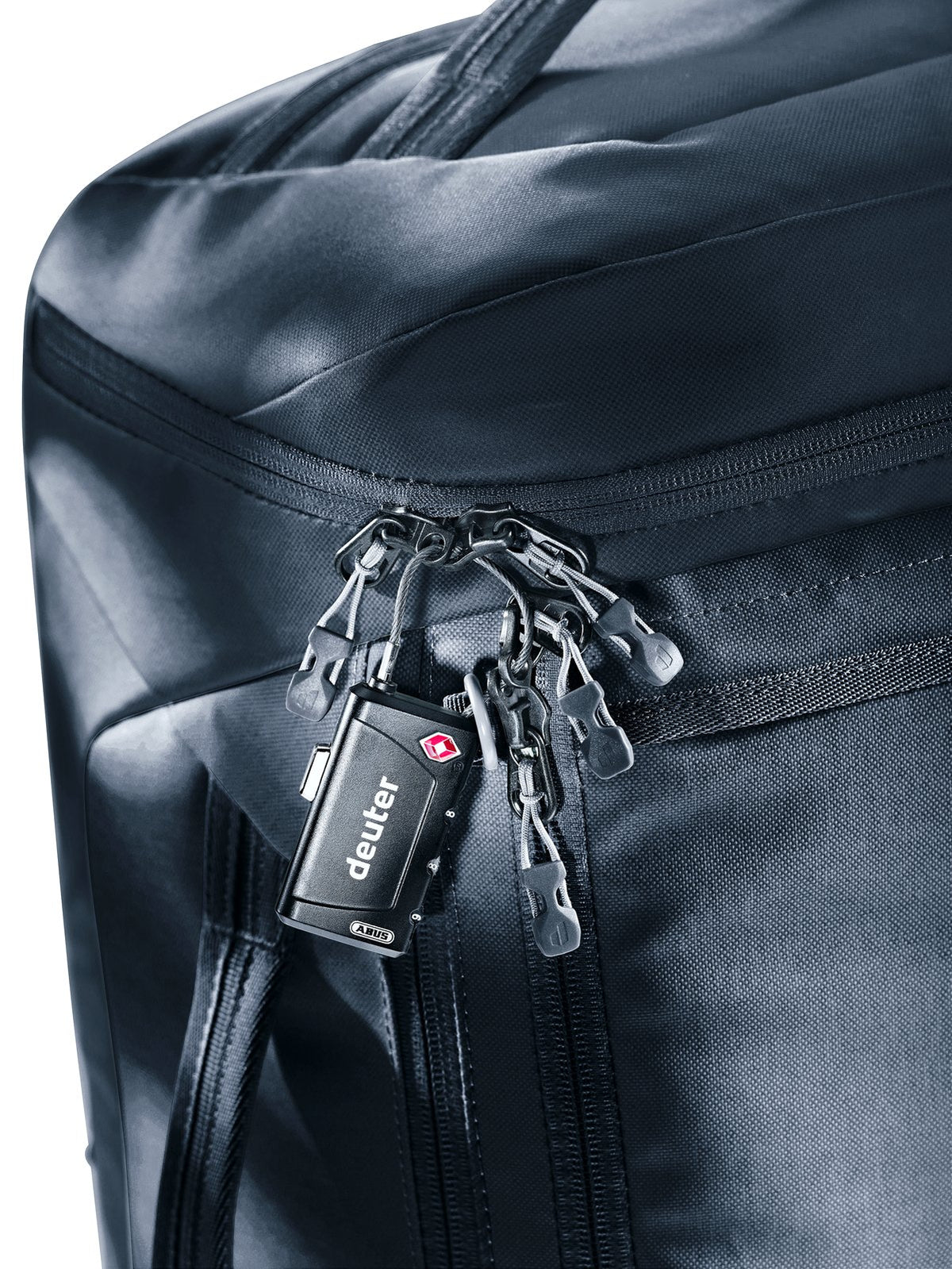 Close-up of a padlock through the zip pullers at the Duffel Pro Pack 30 padlock anchor point