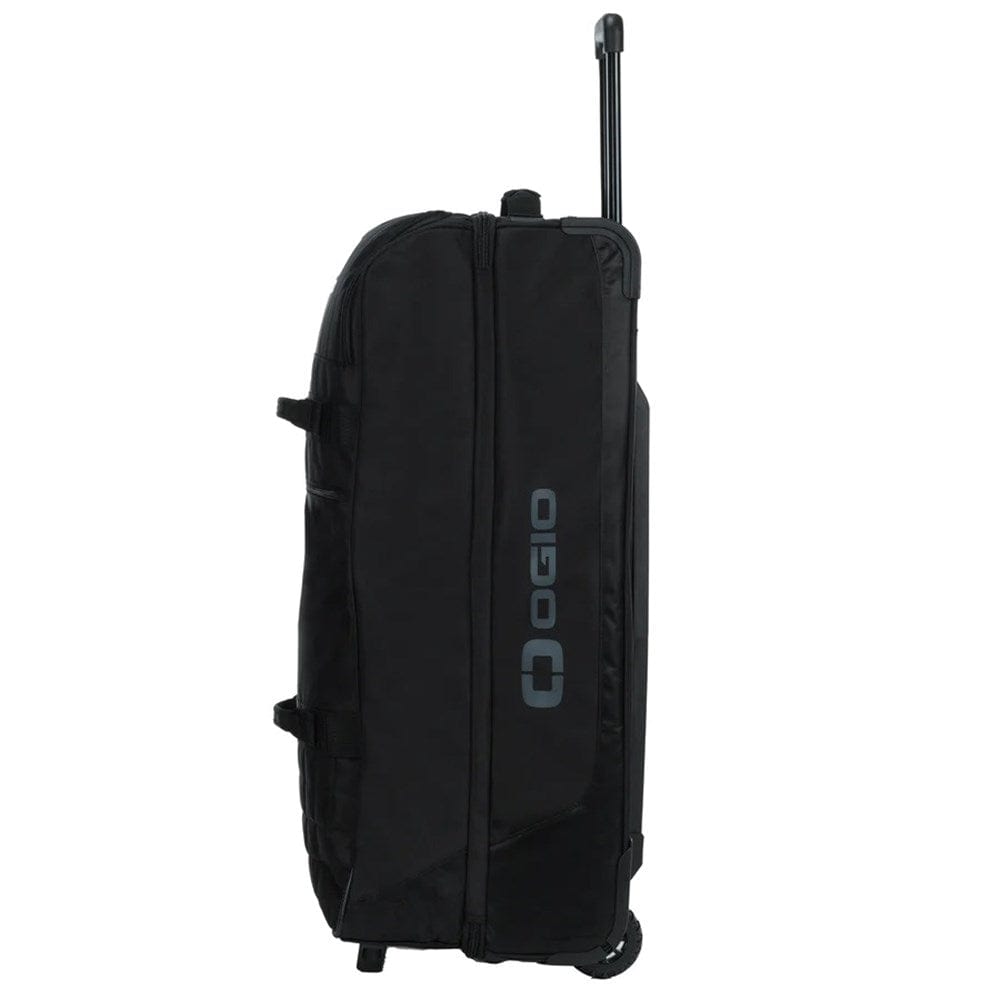 OGIO Trucker Gear Bag in Black, side profile with grey OGIO logo and handle up