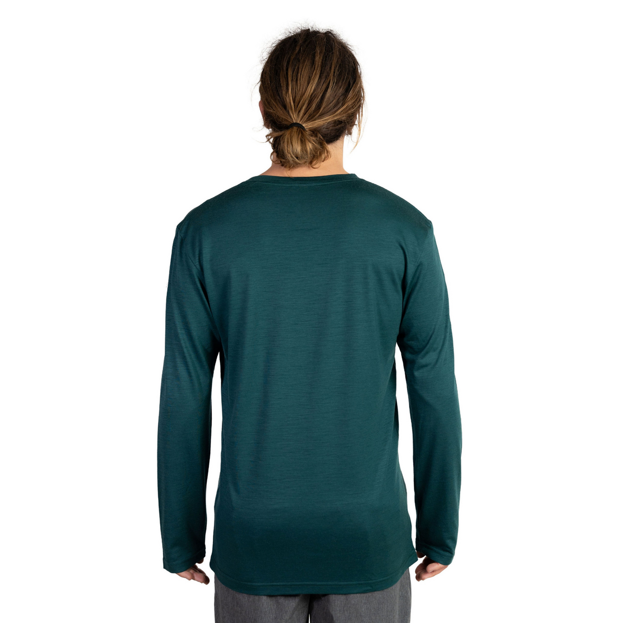 Back shot of Ottie Merino men's Otway Fern long sleeve merino wool t-shirt on 173cm model who is wearing a size medium