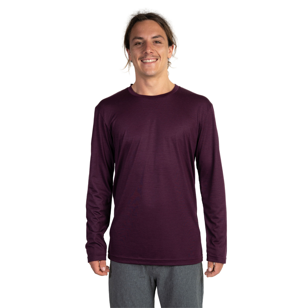 Front shot of Ottie Merino men's Plum long sleeve merino wool t-shirt on 173cm model who is wearing a size medium