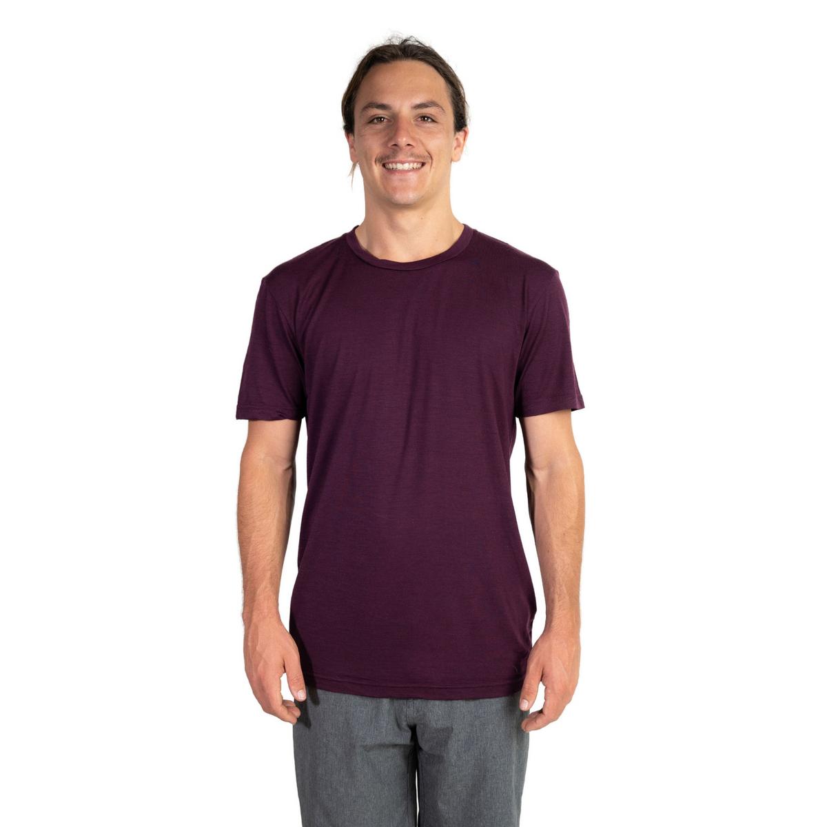 Front shot of Ottie Merino men's Plum short sleeve merino wool t-shirt on 173cm model who is wearing a size medium