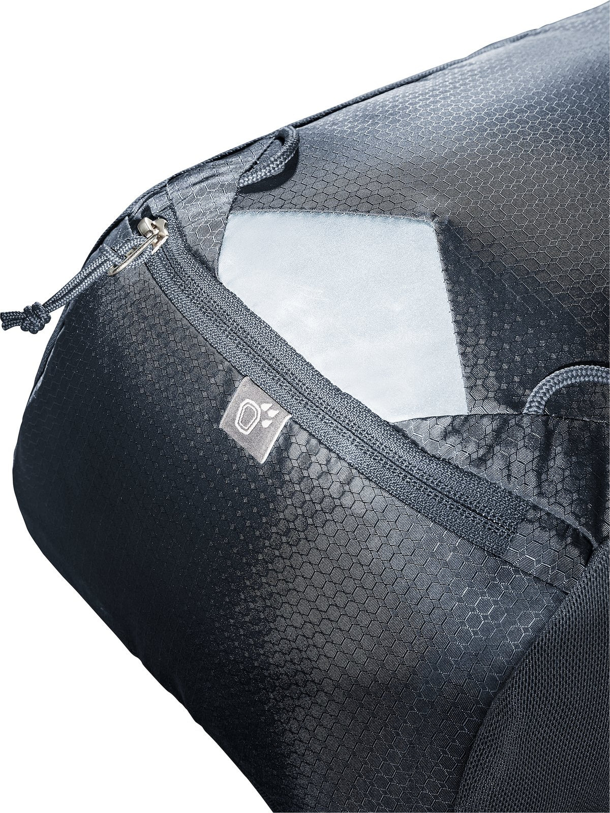 Close-up of the reflective patch and zip on the Deuter Race 12