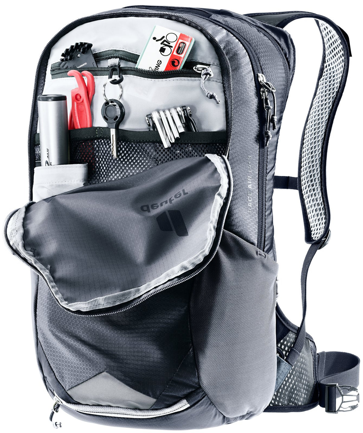Deuter Race Air 14+3 front pocket open showing the tool organiser, pump and keys
