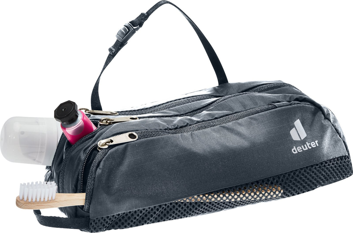 Deuter Wash Bag Tour II open with toothbrush, toothpaste and toiletries