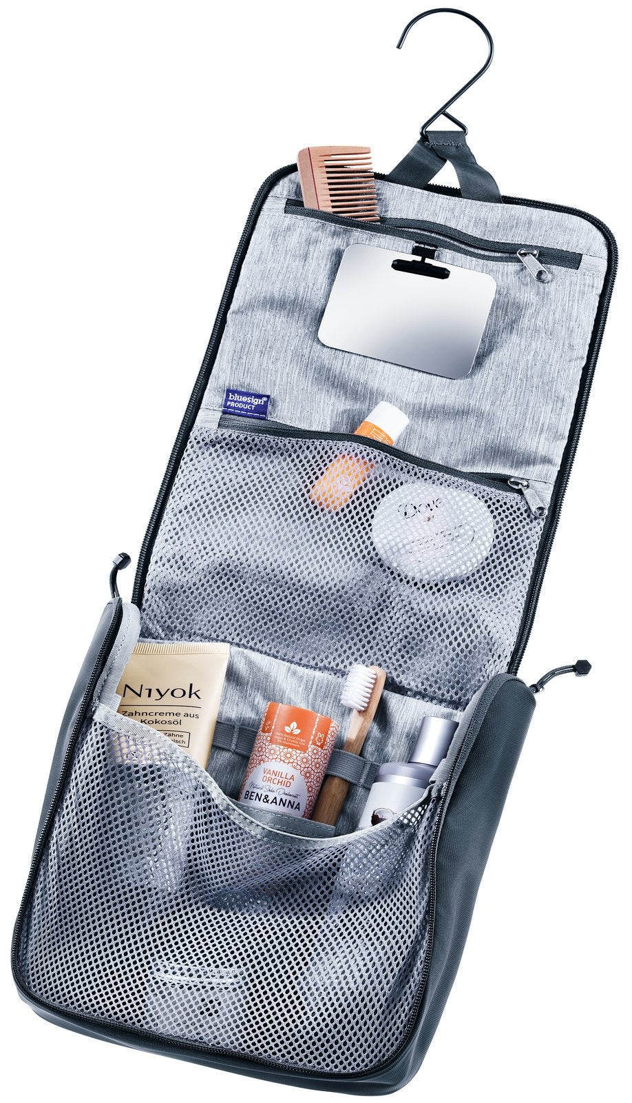 Deuter Wash Center II hanging open on its hook, showing mirror, mesh pockets and toiletries