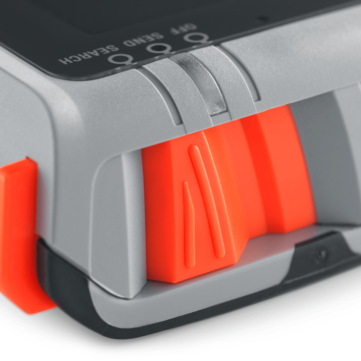 Close-up of the orange OFF, SEND and SEARCH slider on top of the Mammut Barryvox