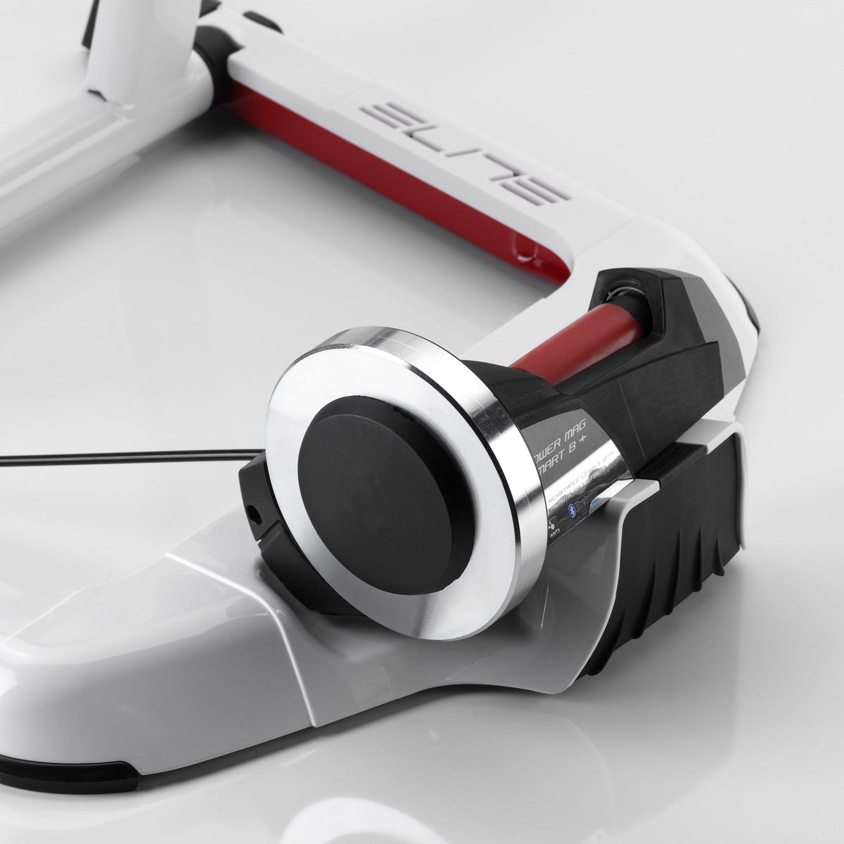 Chrome flywheel and red Elastogel roller on the Elite Qubo Power Mag Smart B+ unit