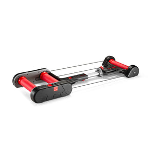 Elite Quick-Motion rollers open, three-quarter view with red parabolic drums and the cable-hung floating frame