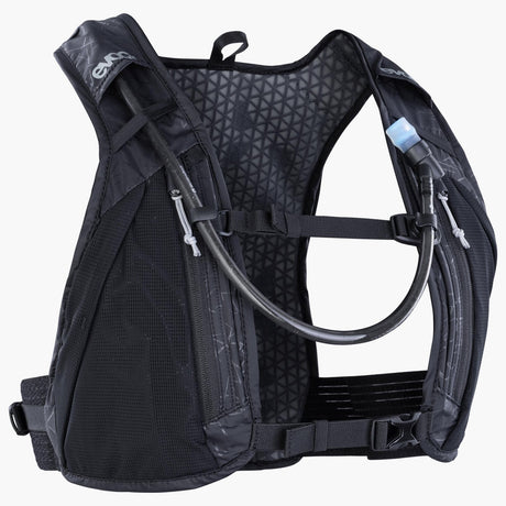 EVOC Hydro Pro 6 hydration vest in black, front three-quarter view with drink tube routed over the shoulder strap