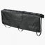 EVOC Tailgate Pad Curve in black with grey map print and EVOC logos, laid flat with its straps