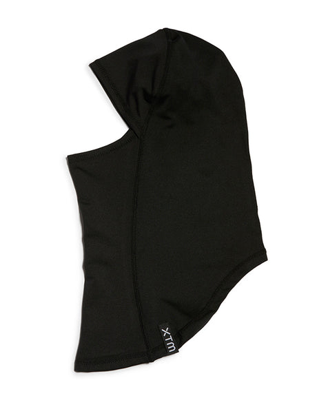 XTM Kids Blindside balaclava in Black, side view showing the face opening and woven XTM label