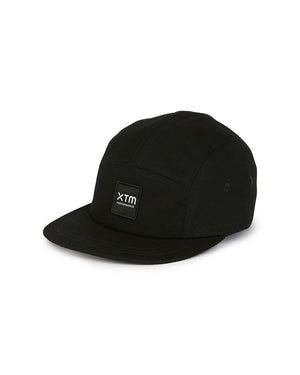 XTM Hakea organic cotton cap in Black, three-quarter product view with logo patch