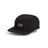 XTM Alpine Puffer Cap in Black, front three-quarter view showing quilted panels and embroidered XTM Performance logo