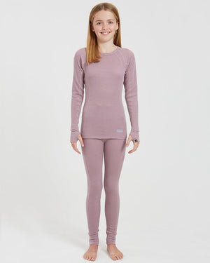 XTM Kids Alpine230 Merino Thermal Pants in Fog, full-length view on a girl wearing a matching thermal top