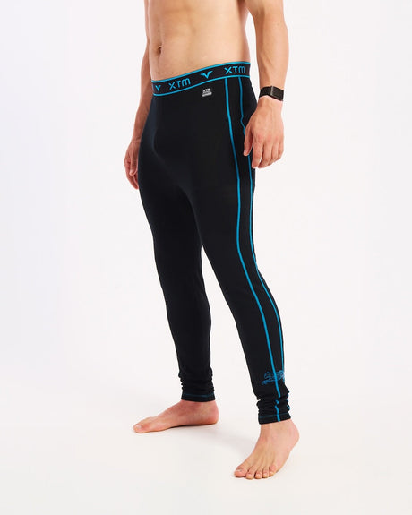 XTM Valentino Active200 merino thermal pants in black with blue seams, three-quarter front view