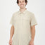 Man wearing the XTM Dunkeld short sleeve hiking shirt in Sand, front view