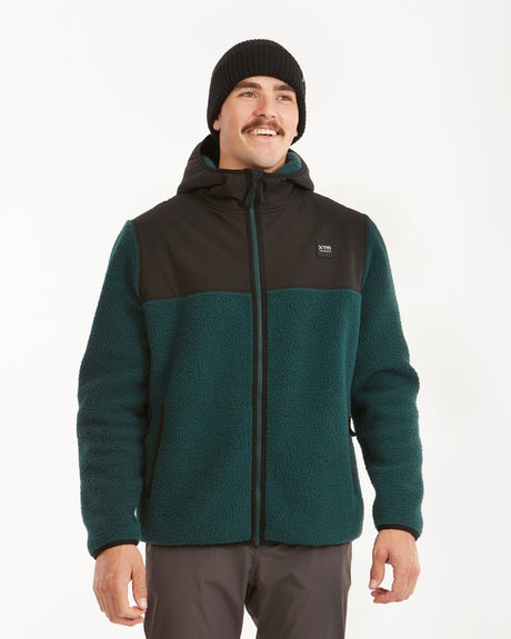 Three-quarter front view of the Pine XTM Treachery hooded sherpa fleece jacket