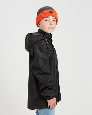 Side view of the XTM Kids Stash 2L packable rain jacket in Black, hood down