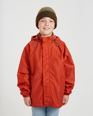 XTM Kids Stash 2L rain jacket in Burnt Orange, front view showing elastic cuffs and hem