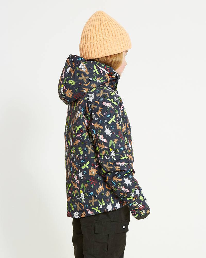 Side view of the Woodland Navy XTM Kids Yama Snow Jacket with the hood down behind the neck