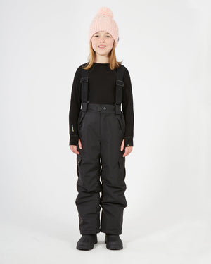 XTM Kids Pluto II Snow Pant in Black, front view on a child with braces over a black top