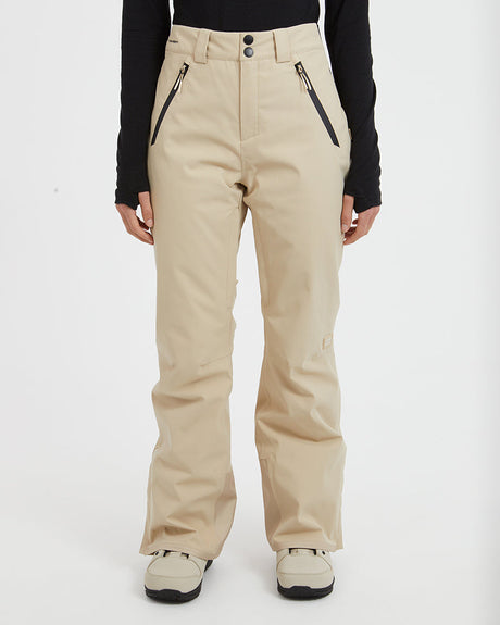 Front view of the XTM Astra women's ski pants in Almond with black pocket zips