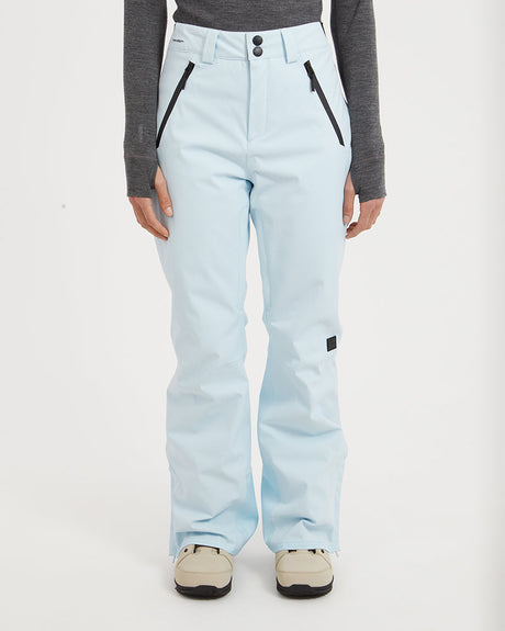 Front view of the XTM Astra women's ski pants in Sky Blue with black pocket zips