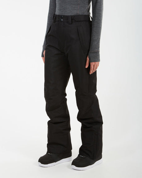 Three-quarter view of black XTM Smooch ski pants worn with snow boots