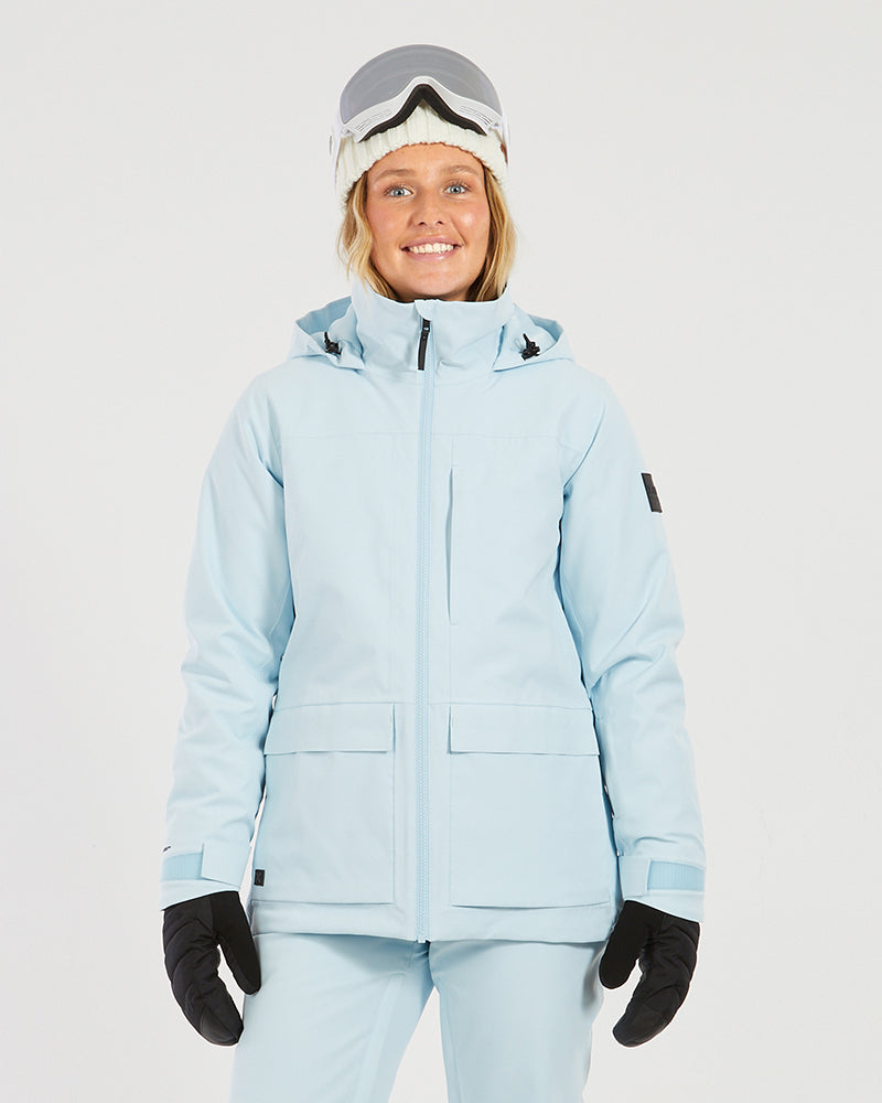 XTM Elevation II women's ski jacket in Sky Blue worn with matching pants, front view