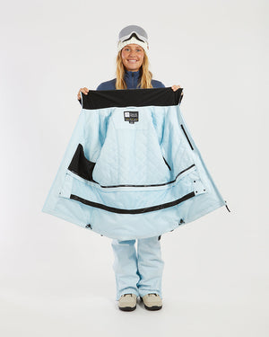 Sky Blue XTM Elevation II held open to show the quilted lining, inner pockets and powder skirt