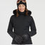 Woman wearing the black XTM Solace ski jacket with black faux fur hood trim, front view