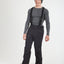 XTM Quest men's ski pant in Black with the bib braces on, worn with ski boots
