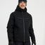 XTM Quantum men's snow jacket in Black, front view on a model wearing goggles and gloves