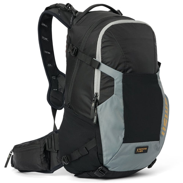USWE Watt 25L E-MTB protector pack in black and grey, front three-quarter view with harness and waist belt