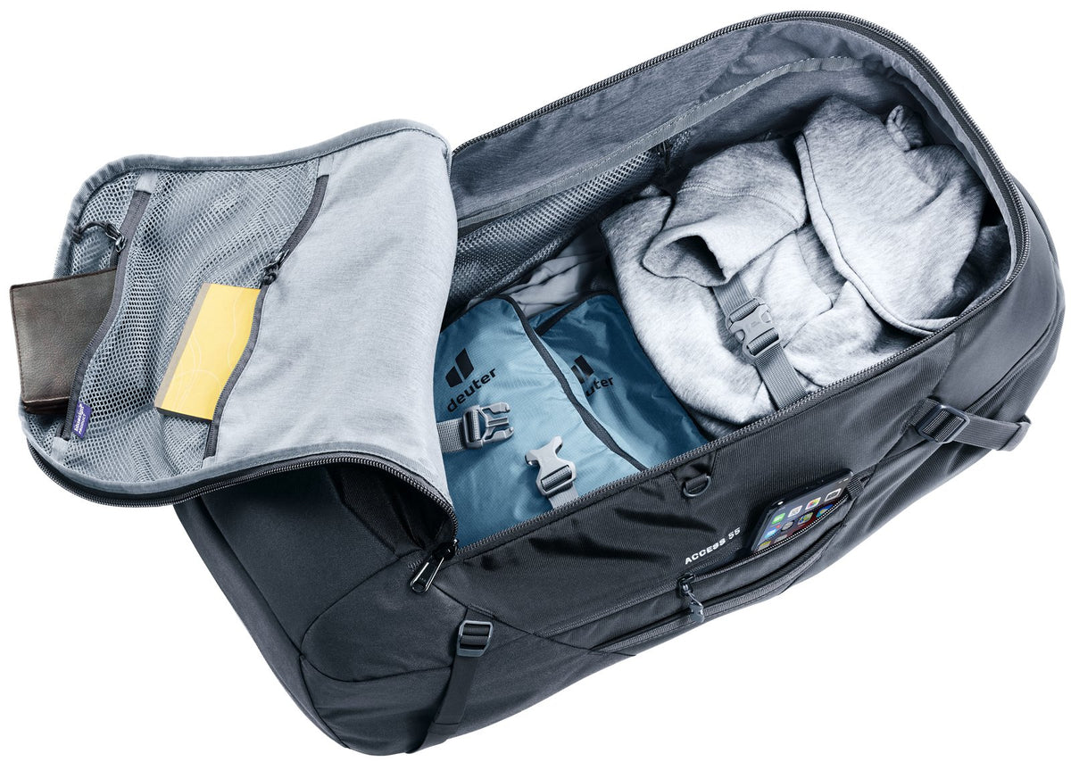 Deuter Access 55 in Black opened suitcase-style showing packed clothes and internal straps