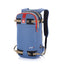 Arva Ride 18 backpack in Blue Denim, front three-quarter view with red zip trim and tan ski straps