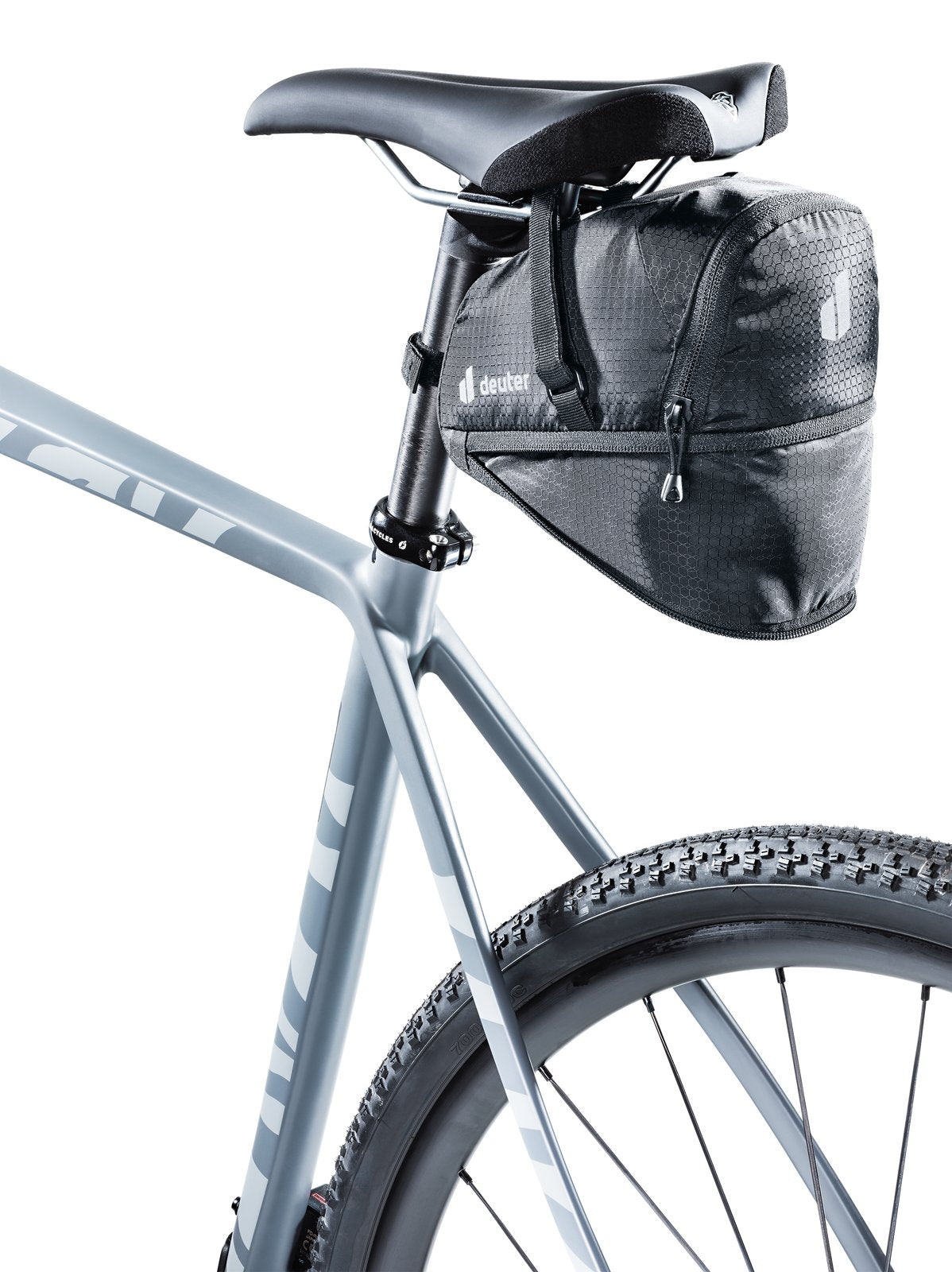 Deuter Bike Bag 1.1 + 0.3 under a bike saddle with the 0.3 L expansion unzipped