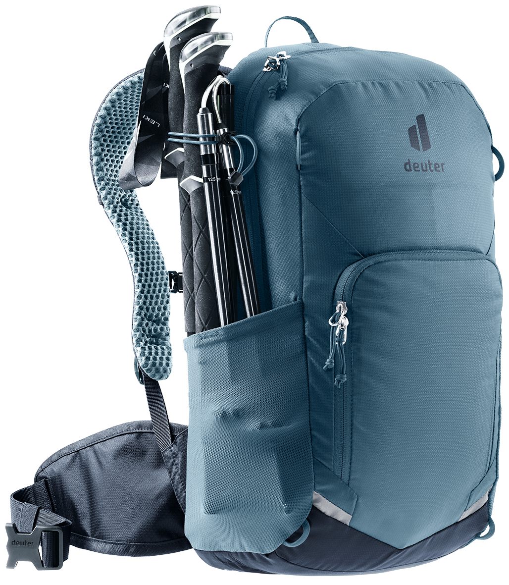Deuter Bike I 20 in Atlantic Ink with folded trekking poles in the side pole attachment