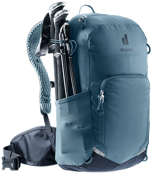 Deuter Bike I 20 in Atlantic Ink with folded trekking poles in the side pole attachment