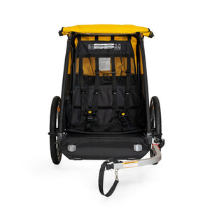 Burley Bee Double front view with the cover open, showing two seats with harnesses