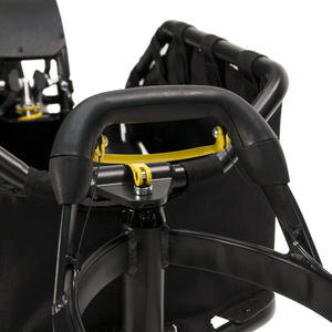 Burley Coho XC front handle with a yellow lever mounted beneath it, kickstand post below